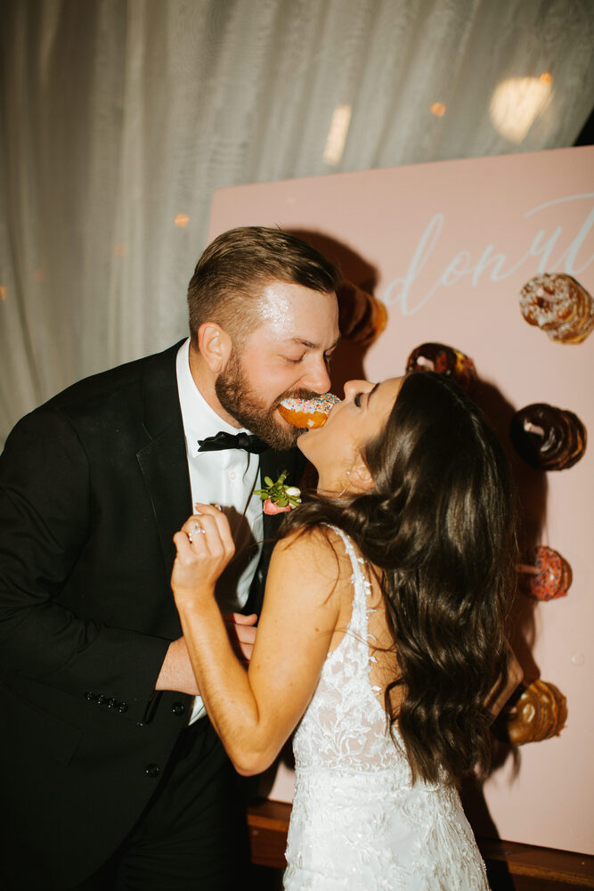 A couple sharing a sweet moment at the reception