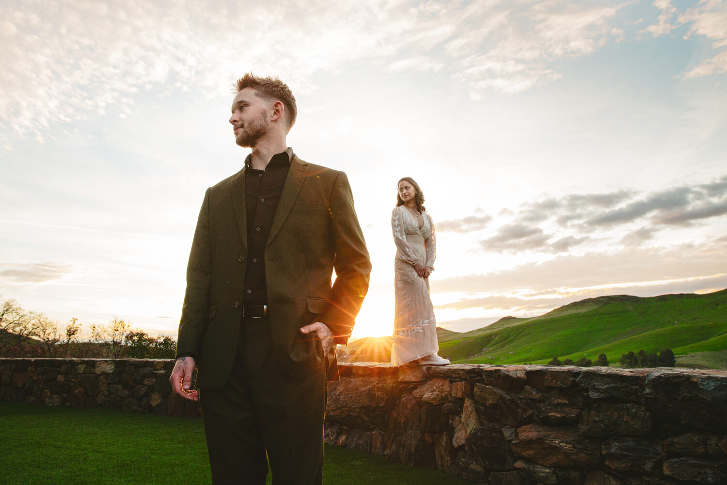 A couple in golden-hour light above the Sierra foothills