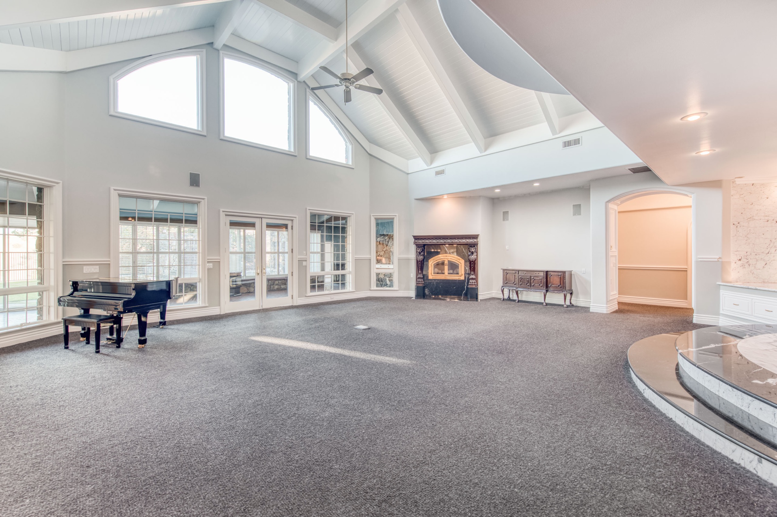 The Residence — a grand vaulted room with a grand piano