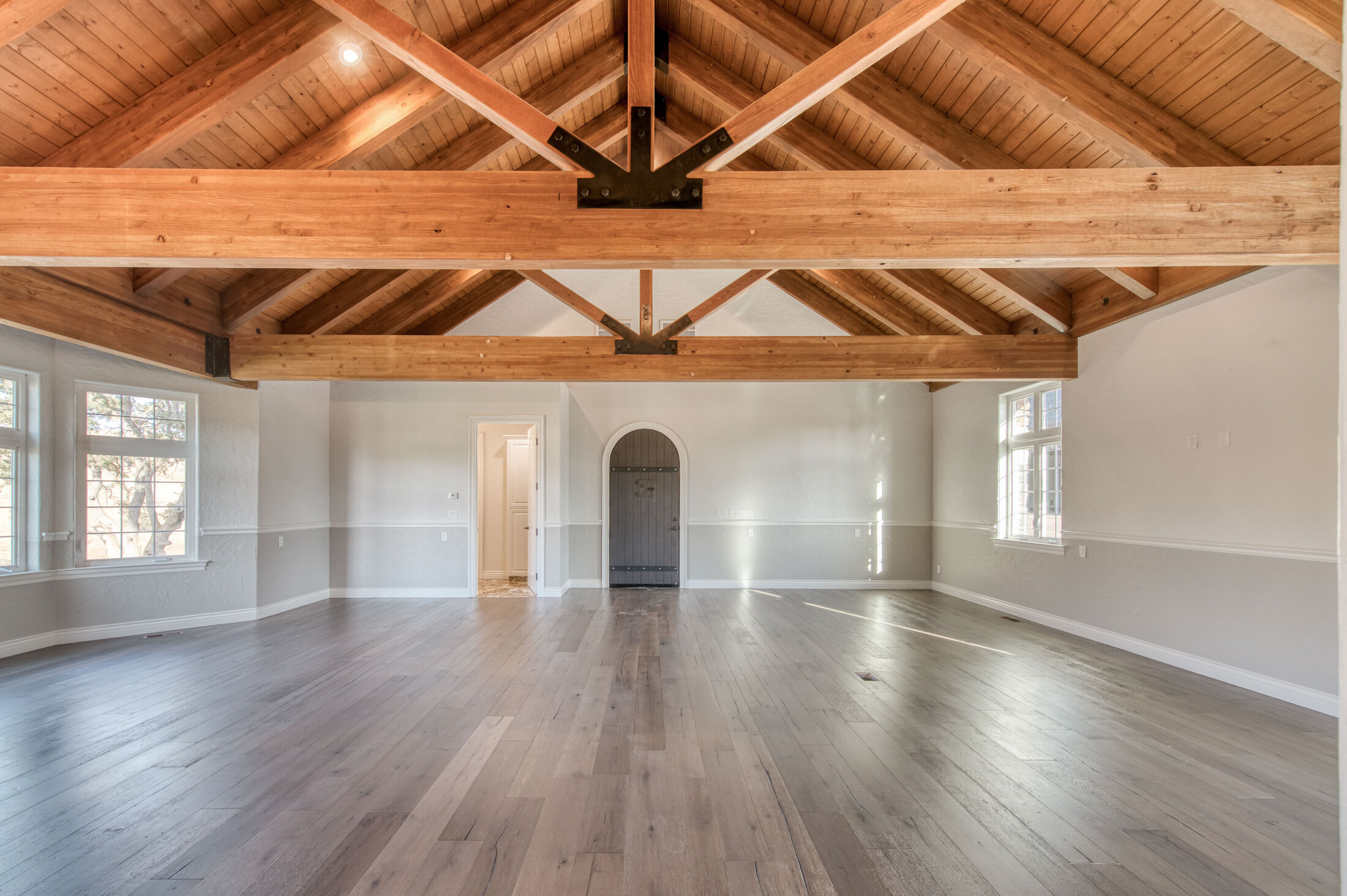 The estate's vaulted timber-beam interior hall